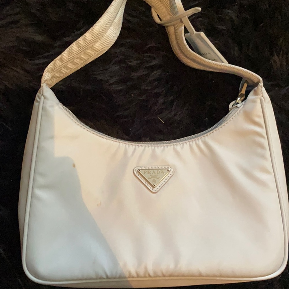 Only used once. I have the boxes to with. Prada